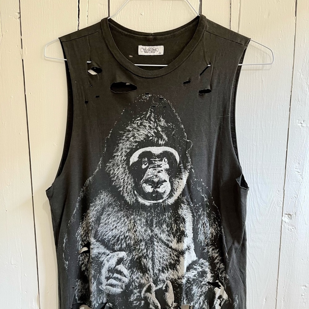 Fer cute gorilla shirt. Has some fun rips in it